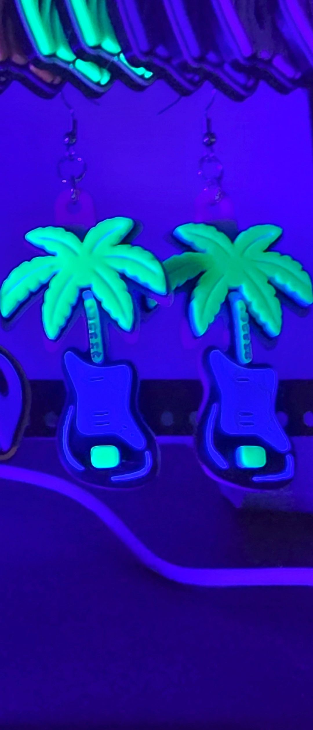 Beach Angel Earrings, photographed under UV light